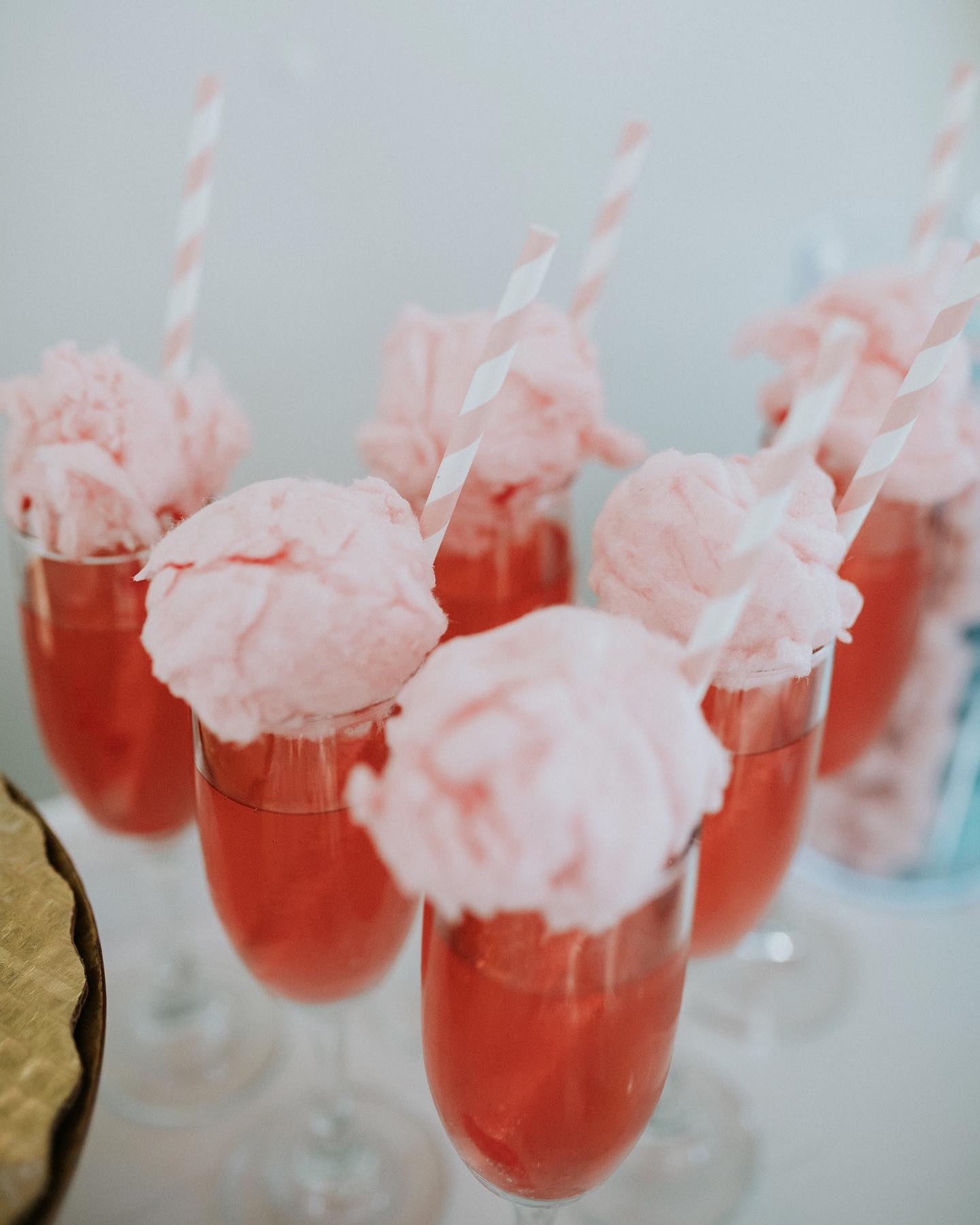 pink drinks with cotton candy on top