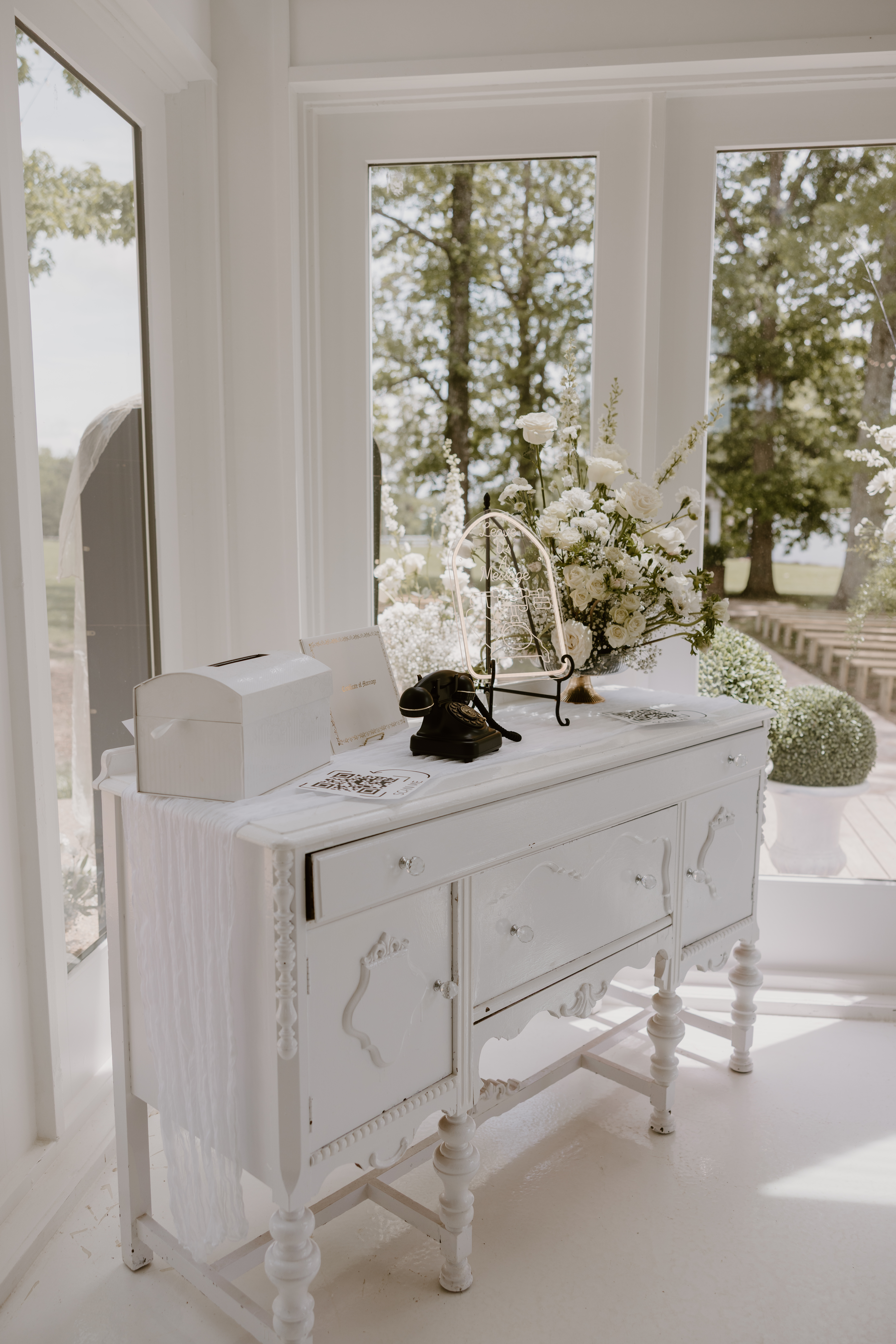 white desk with white flowers on it