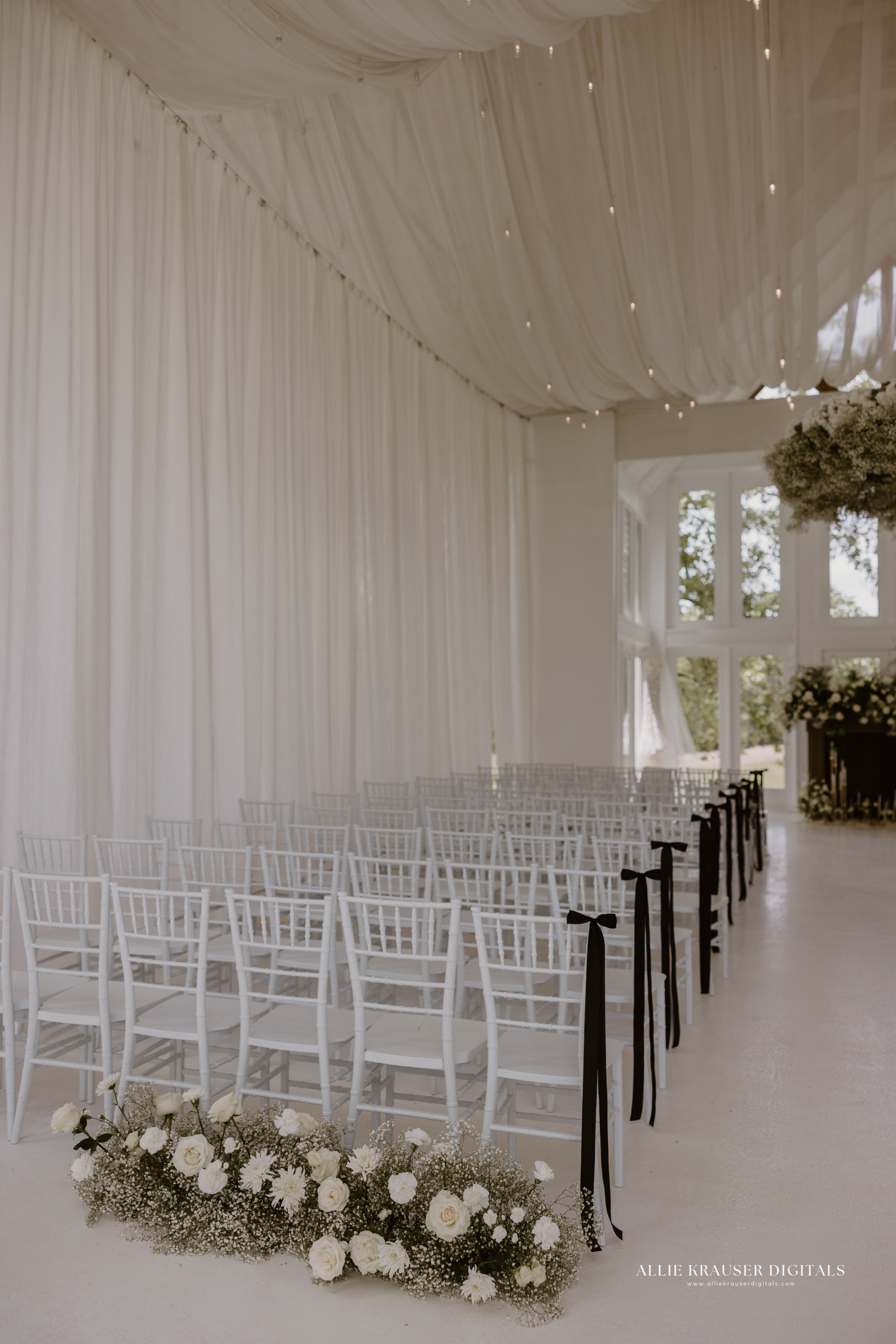 white chairs set up for ceremony - photo by Allie Krauser Digitals